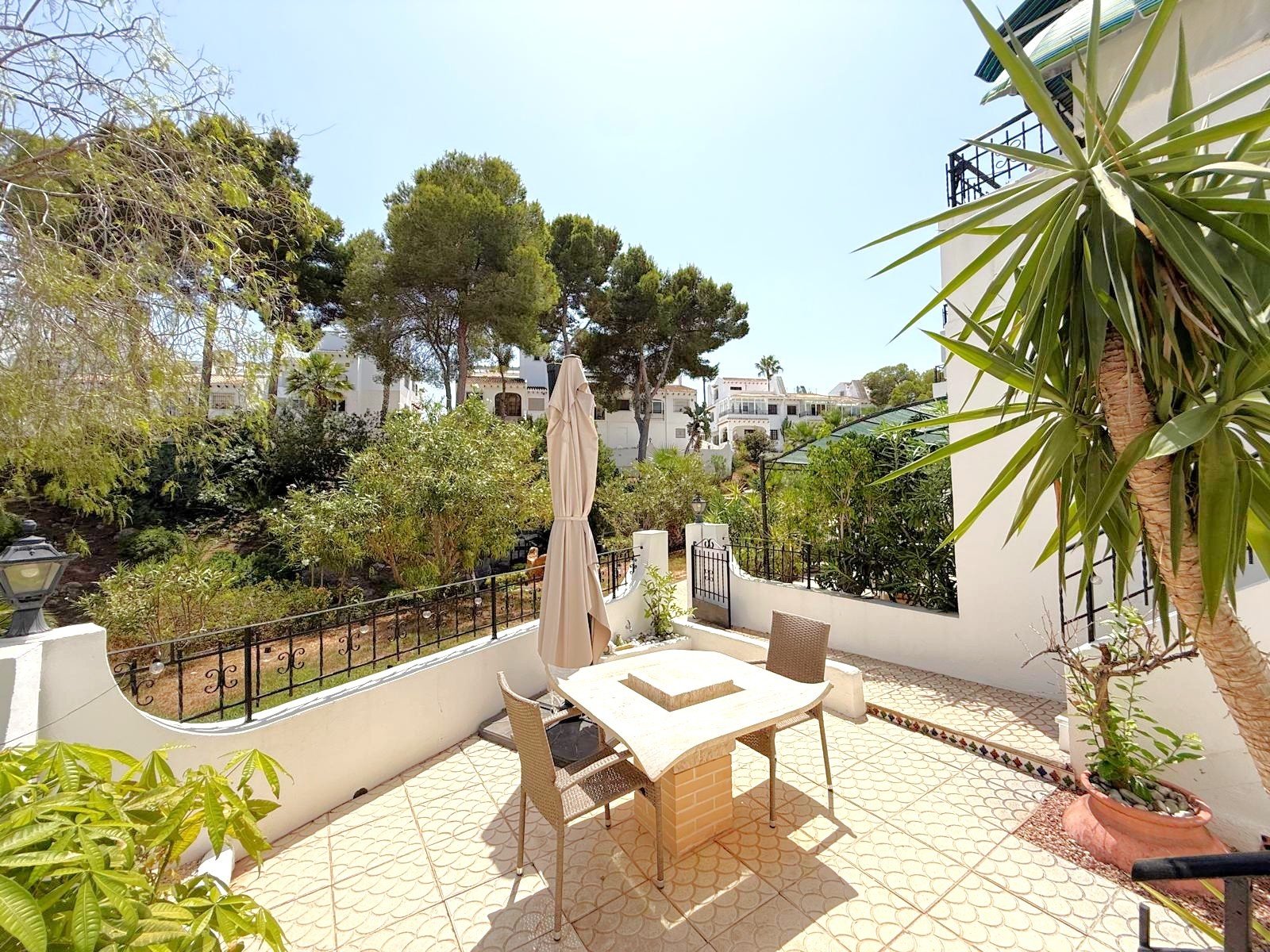 South facing fully refurbished townhouse with self-contained under build overlooking the picturesque communal streams and ponds and landscaped garde
