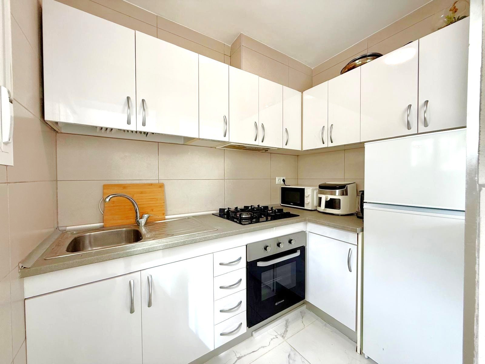 South facing fully refurbished townhouse with self-contained under build overlooking the picturesque communal streams and ponds and landscaped garde