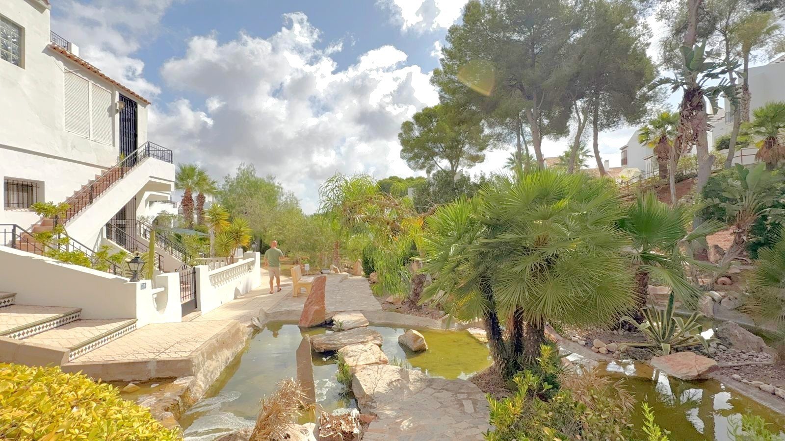 South facing fully refurbished townhouse with self-contained under build overlooking the picturesque communal streams and ponds and landscaped garde