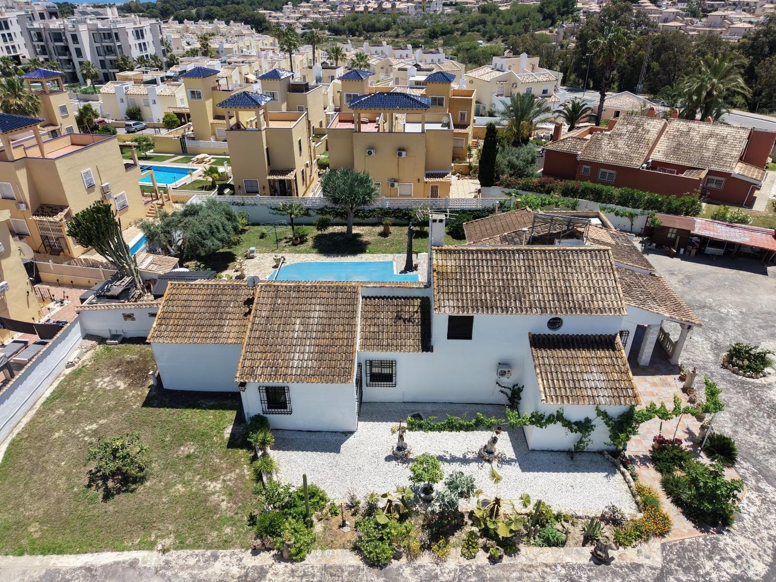 This South Facing, Absolutely Stunning, Four Bedroom, Detached Villa in Villamartin, is located just a couple of minutes drive from the Villamartin