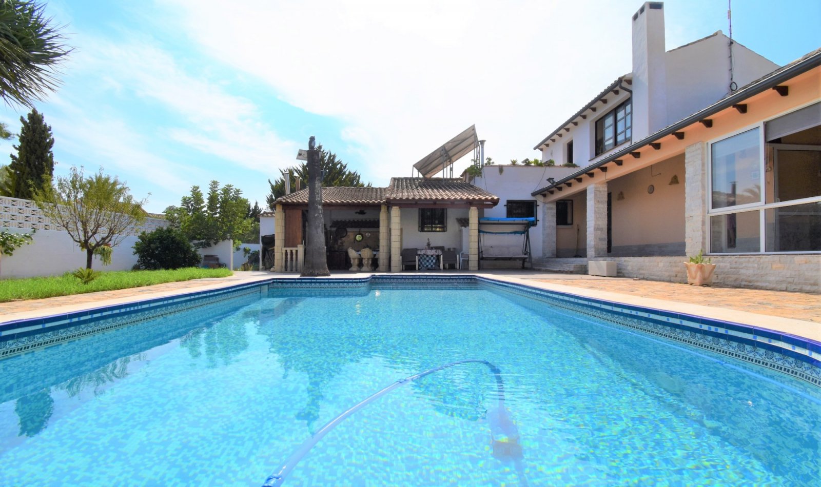 This South Facing, Absolutely Stunning, Four Bedroom, Detached Villa in Villamartin, is located just a couple of minutes drive from the Villamartin