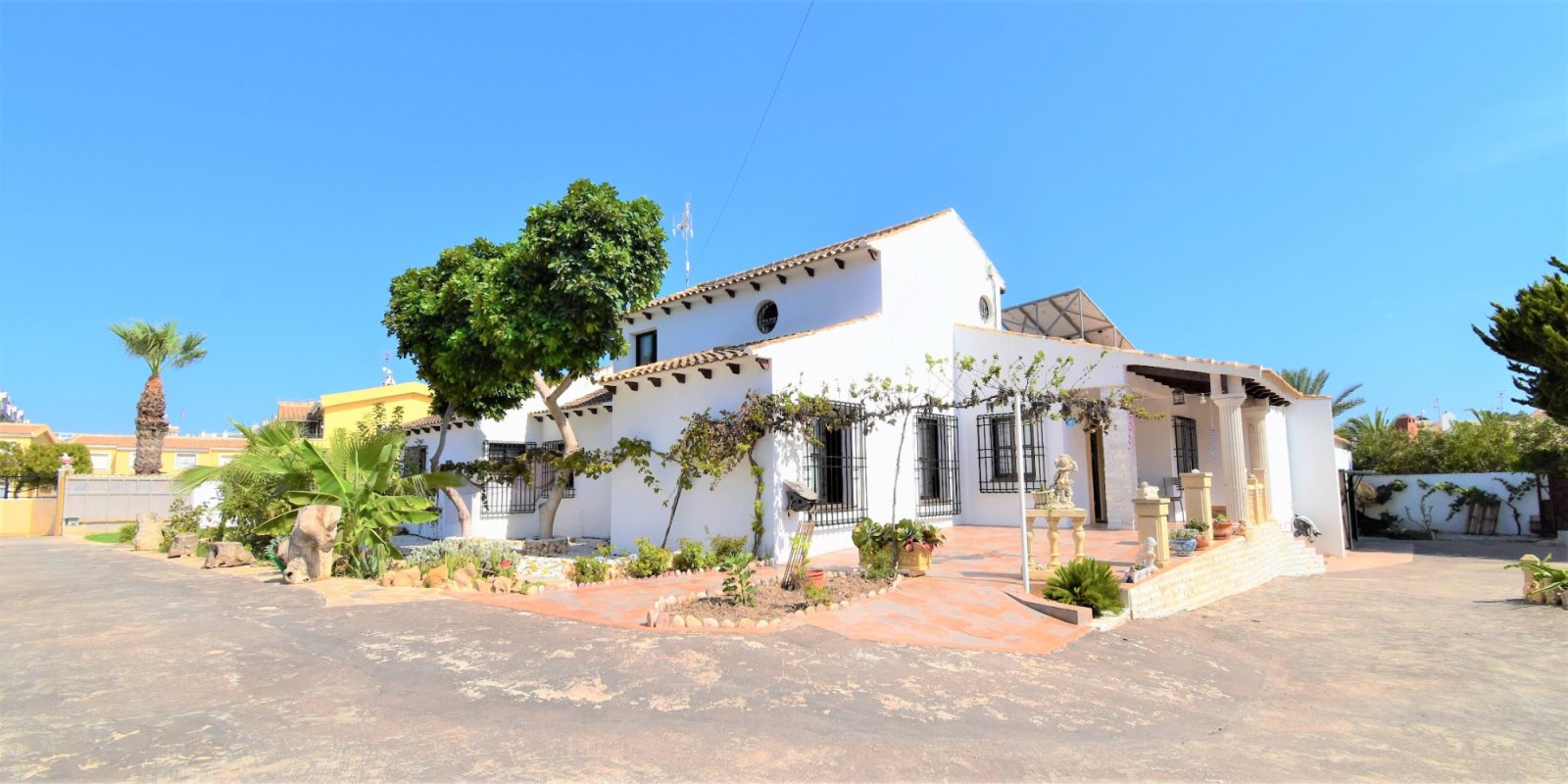 This South Facing, Absolutely Stunning, Four Bedroom, Detached Villa in Villamartin, is located just a couple of minutes drive from the Villamartin