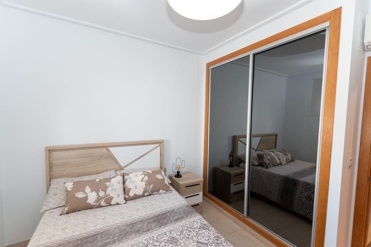 This South-East Facing, Three Bedroom, 2nd Floor Apartment in Los Dolses, Villamartin, is located in a desirable area of the Orihuela Costa, just a