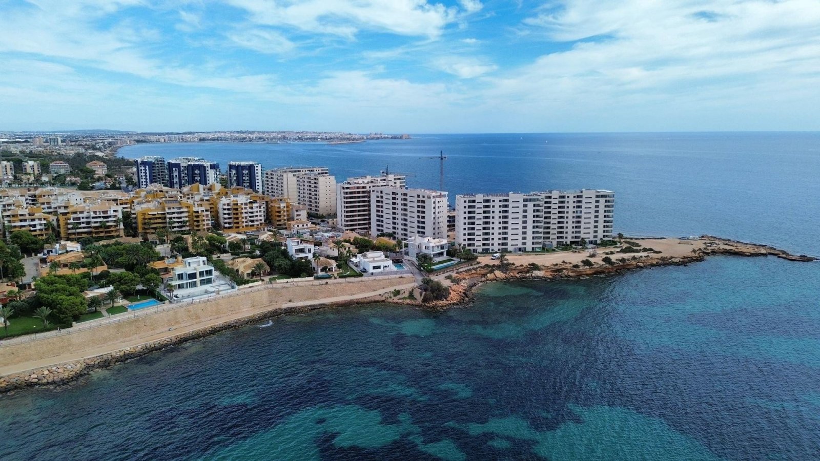 Experience luxury living with exclusive views of the sea and beach in Punta Prima, Torrevieja. This development offers 2- and 3-bedroom apartments,