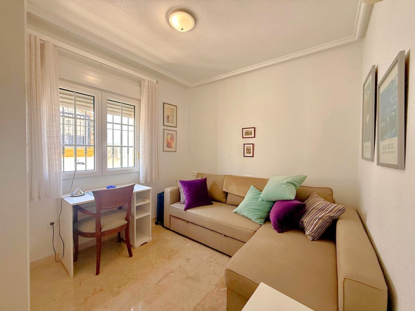   This apartment has lovely views over the communal pool and garden area along with views down to the sea from its south facing balcony and roof terra
