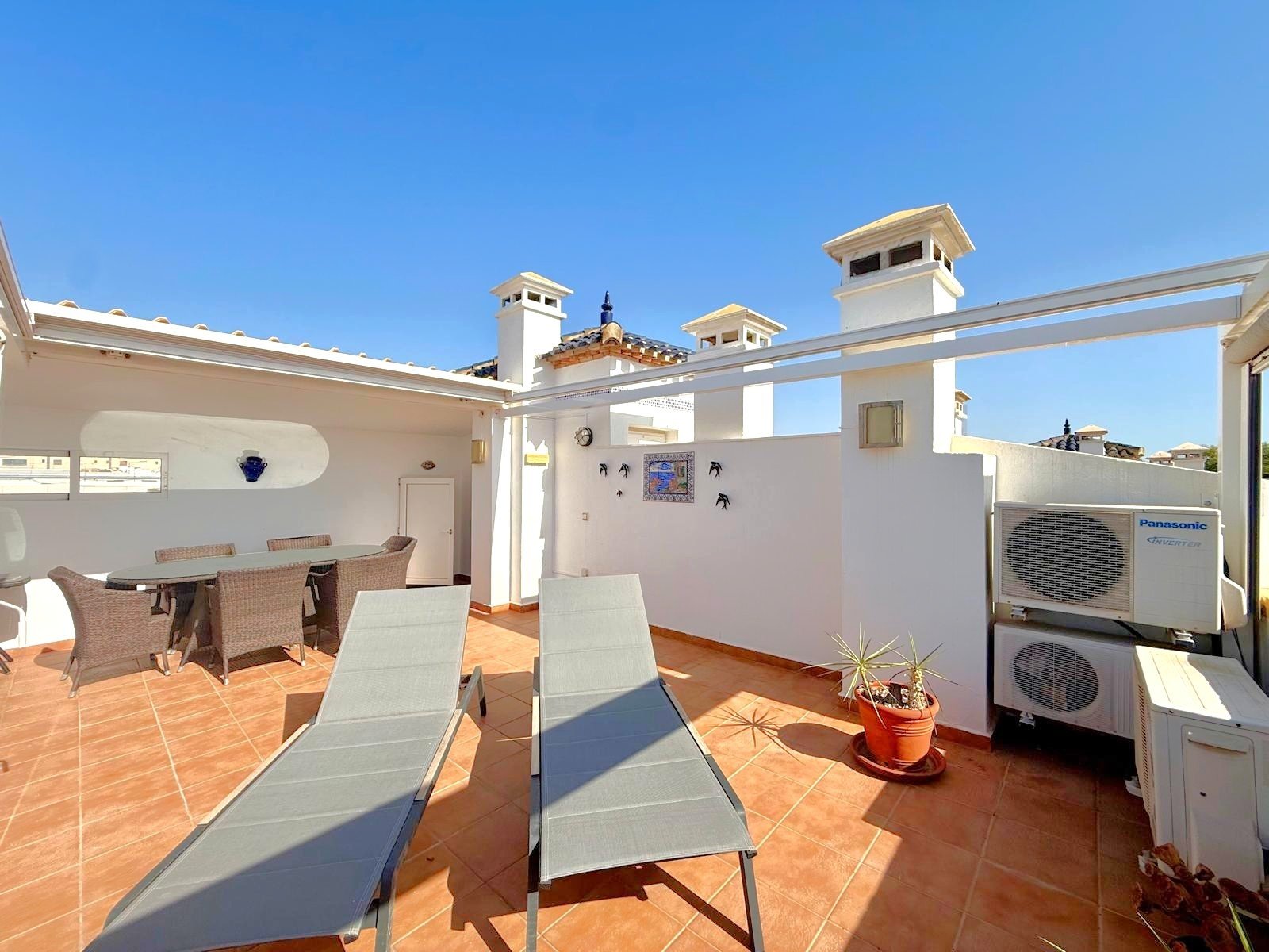   This apartment has lovely views over the communal pool and garden area along with views down to the sea from its south facing balcony and roof terra