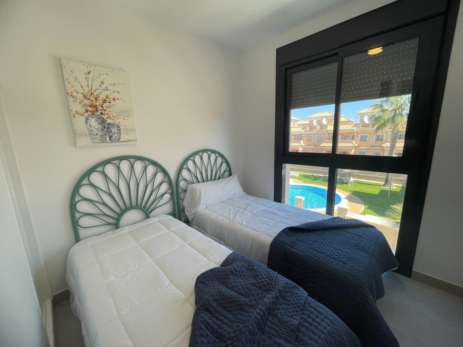   This South Facing, Two Bedroom, Top Floor Corner Apartment in Villamartin is located within a 10 minute walk of a main chain supermarket, JYSK furni