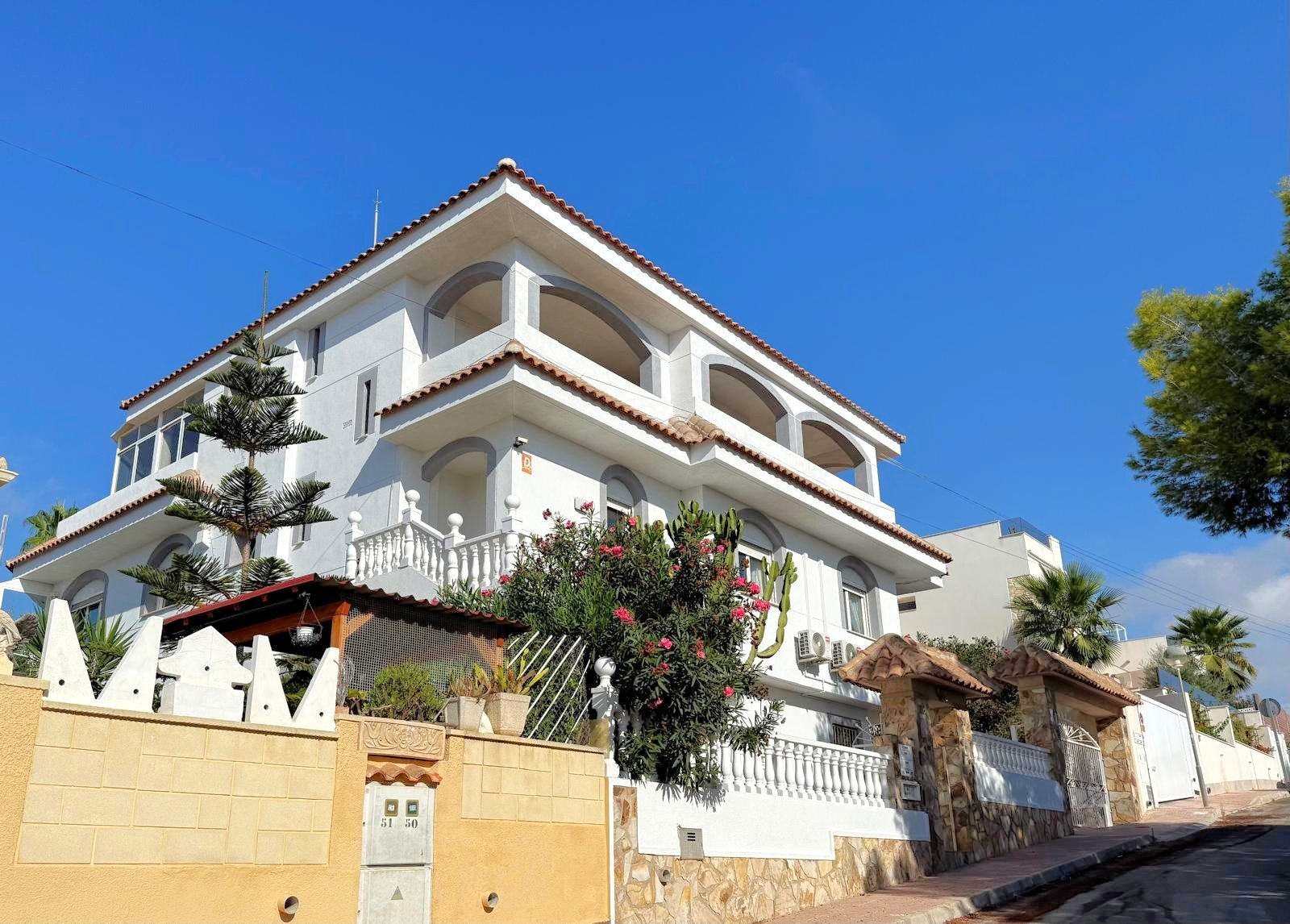 An impressive Mediterranea style villa enjoying a privileged elevated position and perfect orientation for sun close to 3 golf courses, white sand
