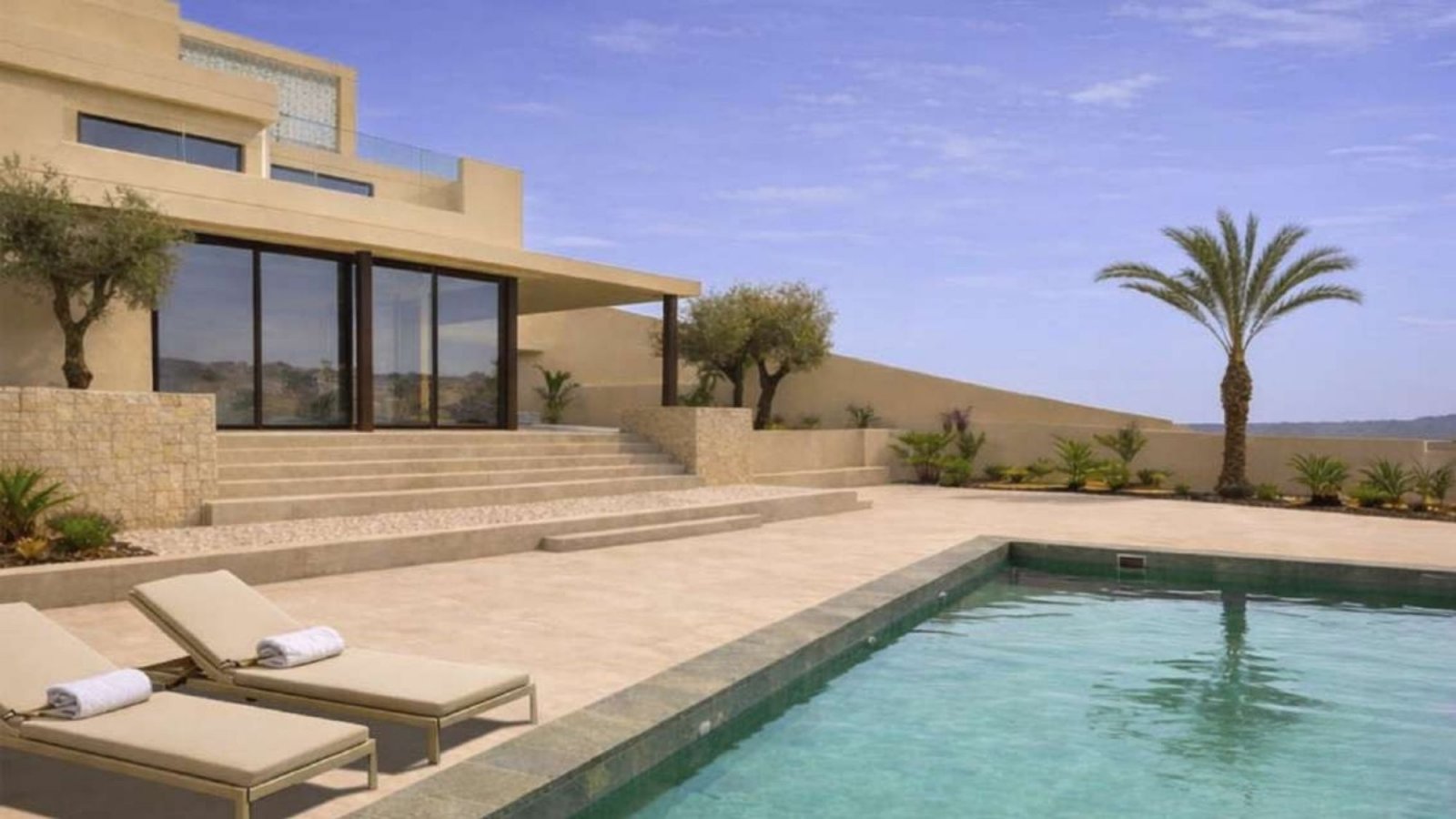  In der charmanten Gegend von La Marina gelegen, bietet diese Villa ein außergewöhnliches Wohnerlebnis. Mit einem modernen und eleganten Design ist di