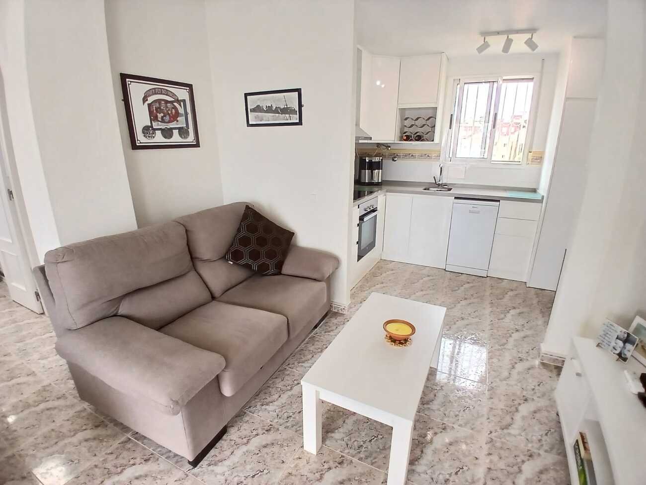 This beautifully renovated first-floor apartment is ideally situated in the sought-after area of Villamartin, offering a fantastic combination of mo