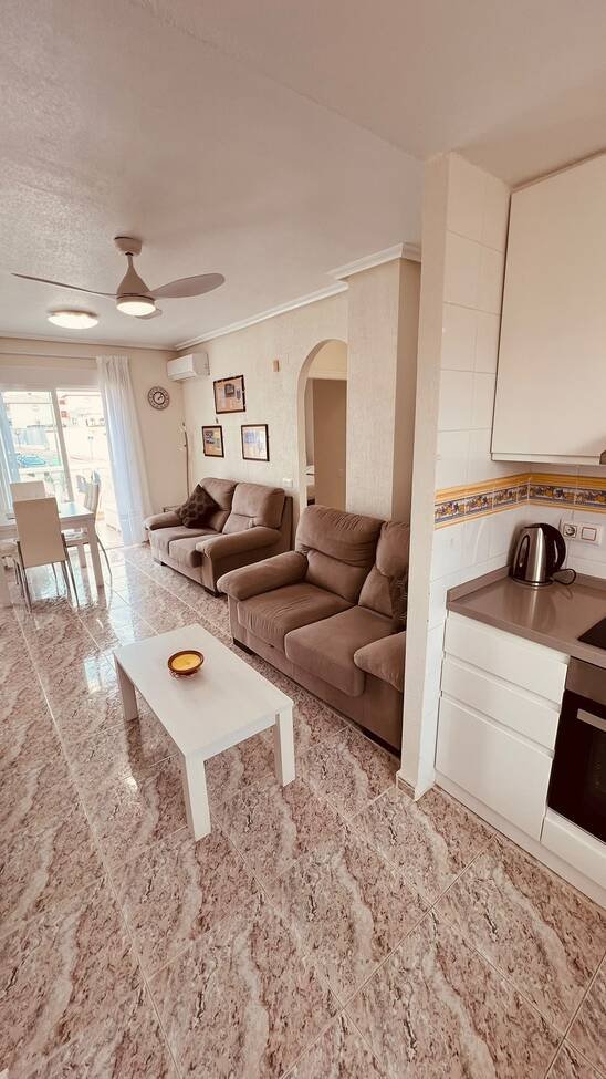 This beautifully renovated first-floor apartment is ideally situated in the sought-after area of Villamartin, offering a fantastic combination of mo