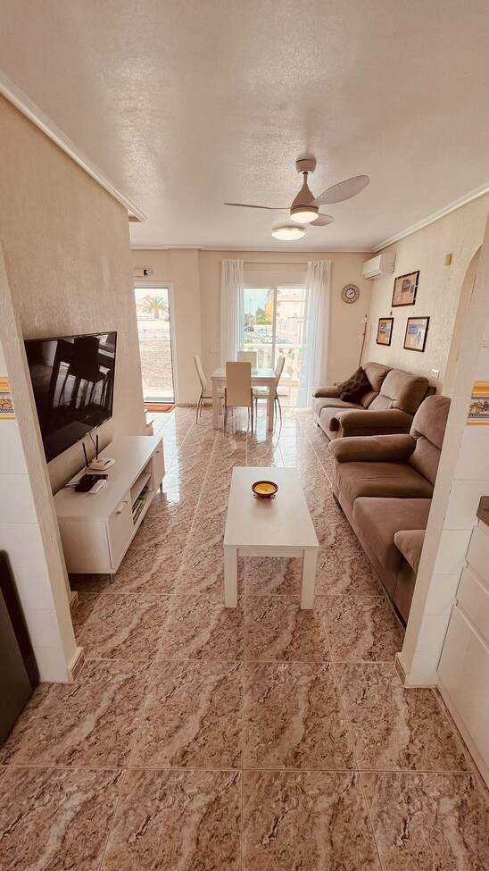 This beautifully renovated first-floor apartment is ideally situated in the sought-after area of Villamartin, offering a fantastic combination of mo