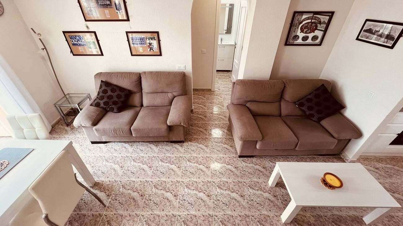 This beautifully renovated first-floor apartment is ideally situated in the sought-after area of Villamartin, offering a fantastic combination of mo