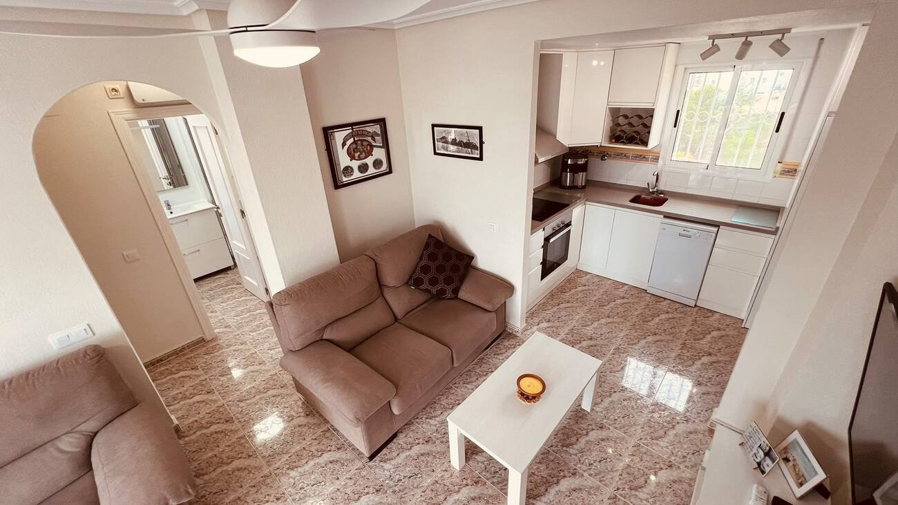 This beautifully renovated first-floor apartment is ideally situated in the sought-after area of Villamartin, offering a fantastic combination of mo