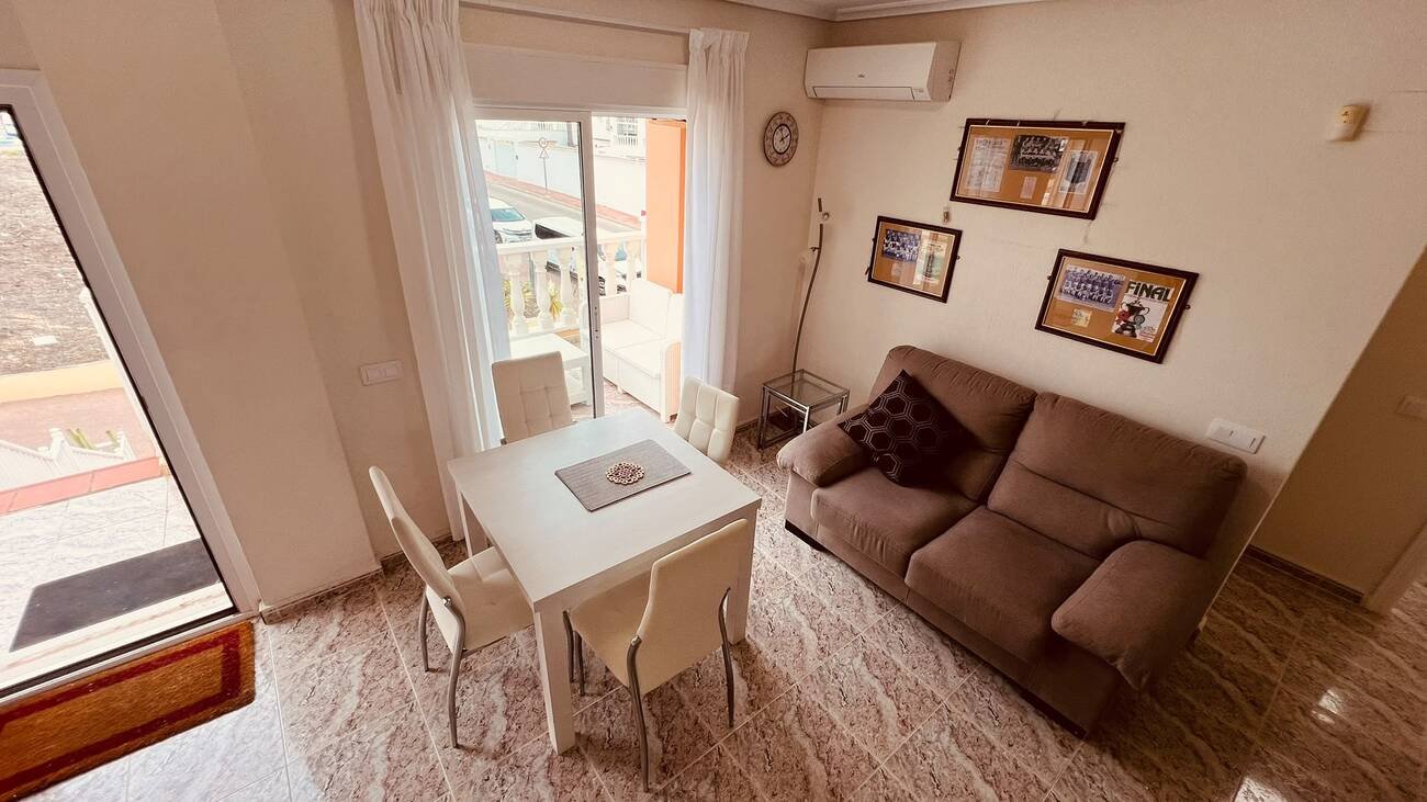 This beautifully renovated first-floor apartment is ideally situated in the sought-after area of Villamartin, offering a fantastic combination of mo