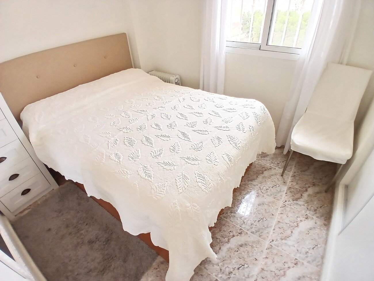 This beautifully renovated first-floor apartment is ideally situated in the sought-after area of Villamartin, offering a fantastic combination of mo