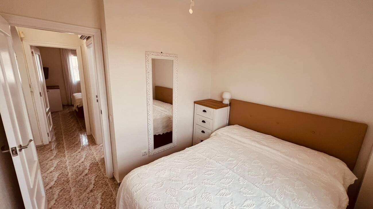 This beautifully renovated first-floor apartment is ideally situated in the sought-after area of Villamartin, offering a fantastic combination of mo