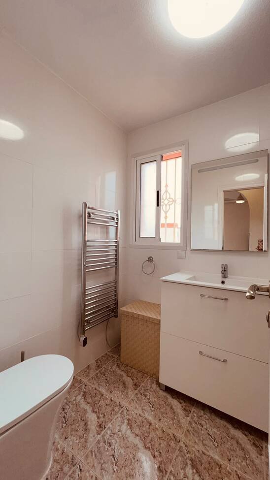 This beautifully renovated first-floor apartment is ideally situated in the sought-after area of Villamartin, offering a fantastic combination of mo