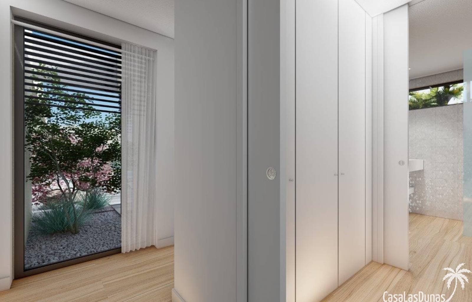 Diese Luxusvilla wurde entworfen, um sich in die Gemeinschaft und die erstaunlichen bepflanzten Bereiche, die die Villa umgeben, einzufügen. In diese