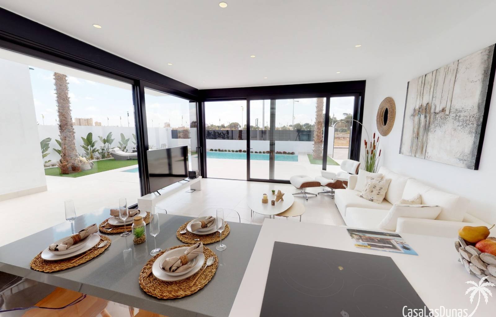  Diese Doppelhaushälften liegen nur 10 Gehminuten vom Strand Mar Menor entfernt. Das Haus ist innen sehr geräumig und verfügt über große Terrassen. Es